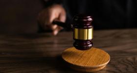 Gavel banging down on table