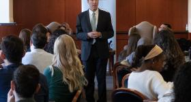Chief Judge of the United States Court of Appeals for the Armed Forces Kevin A. Ohlson speaks to students during a Veterans Day event at GW Law.